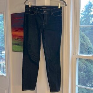 A pair of Talbots dark blue denim flawless 5 pocket slim ankle jeans.